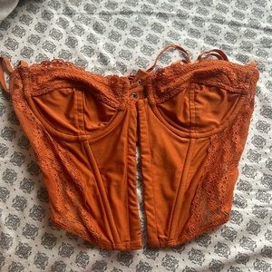 Orange edikted corset top!!! Selling since I am graduating college